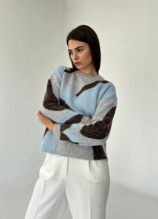 Стильный женский свитер машинная вязка.