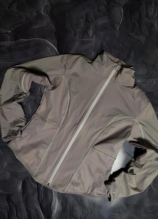 Жіноча  куртка  вітровка  nike storm-fit3 фото