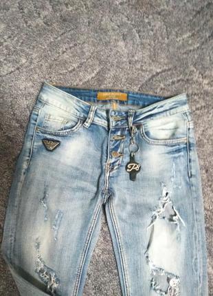 Крутые джинсы рваные скини2 фото