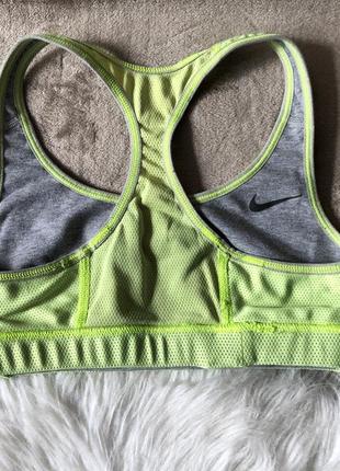 Женский спортивный двухсторонний топ nike dri-fit5 фото