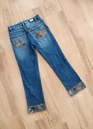 Синие женские джинсы с стильными украшениями, размер s9 фото