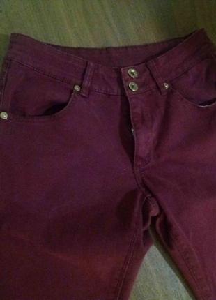 Продам джинси бордові
