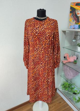 Стильна сукня міді леопард ,з розпіркою