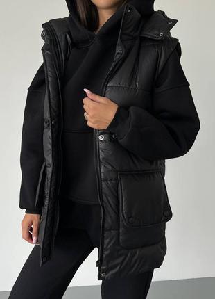 Качественный женский черный стильный утепленный жилет с капюшоном на талии затяжки 2024 года.