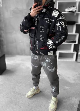 Куртка пуховик с принтами черная8 фото