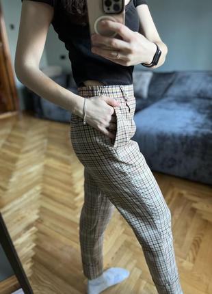 Брюки в клітинку бежеві bershka5 фото