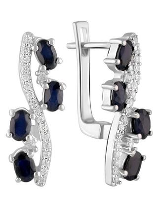 Стильные серебряные сережки с натуральным сапфиром продолговатые изогнутые серьги с маленькими синими камнями