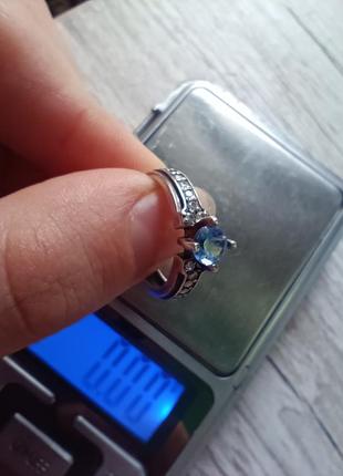 Серебряная кольца с фианитами и голубым камнем, 17р. 9252 фото