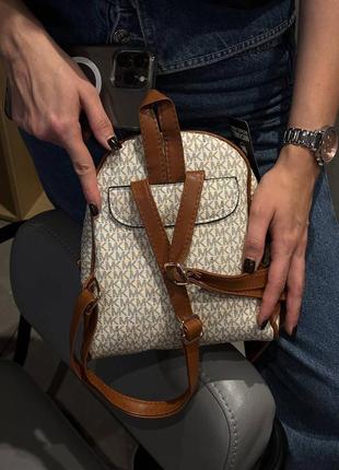 Michael kors monogram backpack mini beige9 фото