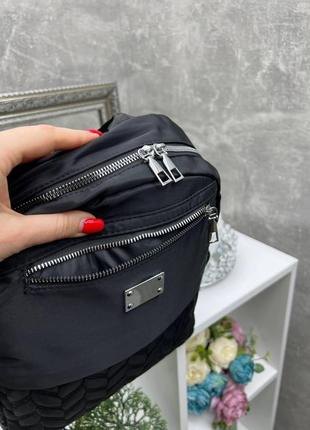 Стильний великий жіночий рюкзак чорний не промокаємий з додатковими кишенями.3 фото