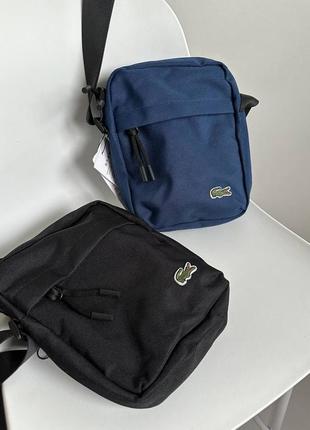 Барсетки lacoste