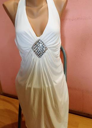 Летнее нарядное платье с завязками на шее и открытыми плечами цвета айвори от бренда evita1 фото