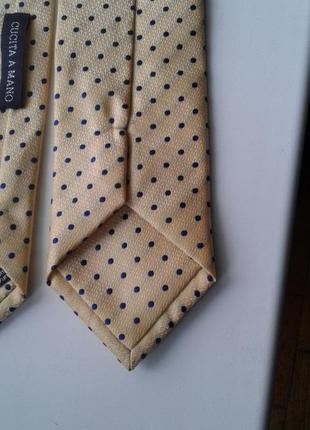 Брендовый шелковый галстук желтого цвета в черную крапинку cucita a mano max mara ручная работа5 фото
