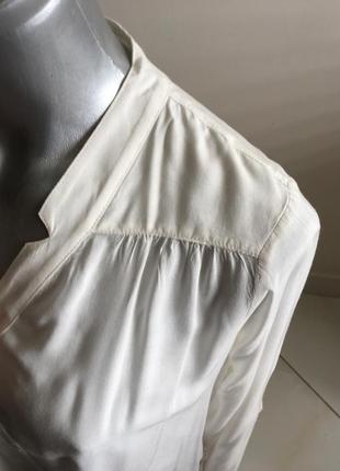 Стильная белая блузка отличного качества.3 фото