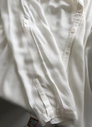 Стильная белая блузка отличного качества.5 фото