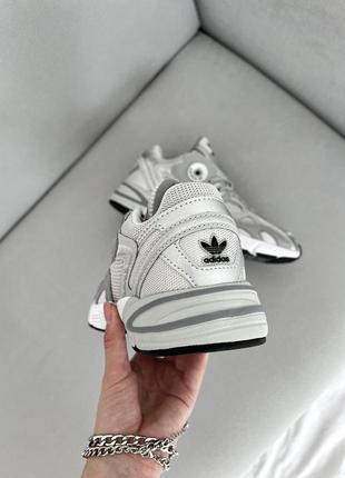 Неймовірні жіночі кросівки adidas astir grey silver сірі9 фото