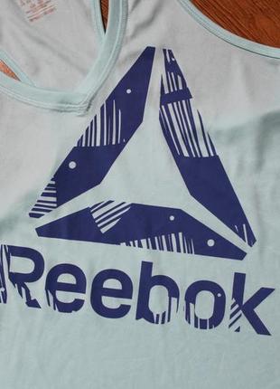 Утонченная спортивная фитнес майка тренеровочная reebok gymana tech tank blue lagoon3 фото