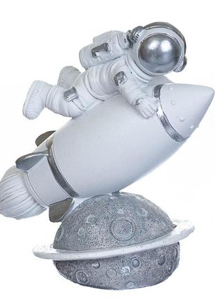 Фігурка "космонавт та ракета"