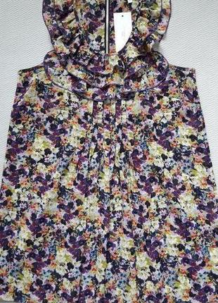 Нарядна блузка безрукавка з рюшами ззаду на блискавки в квітковий принт new look2 фото