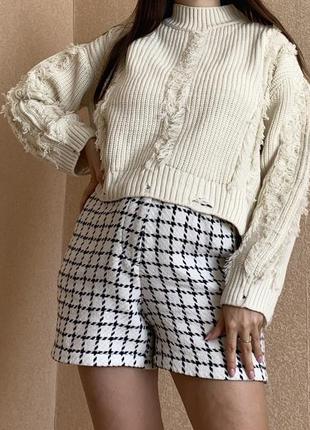 Жіночий в‘язаний светр з рваним ефектом та бахромою2 фото