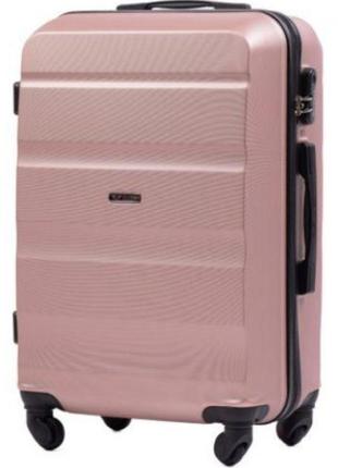 Дорожня міцна валіза рожеве золото на 4 колесах пластикова wings at01 розмір s ручна поклажа рожева