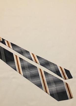 Краватка сіра у смужку та клітинку