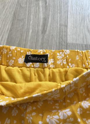 Желтая мини юбка - шорты4 фото