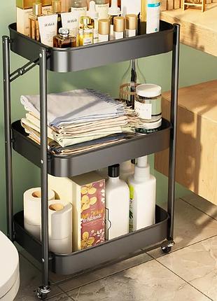 Поличний стелаж на коліщатках металевий, збірний чорного кольору.