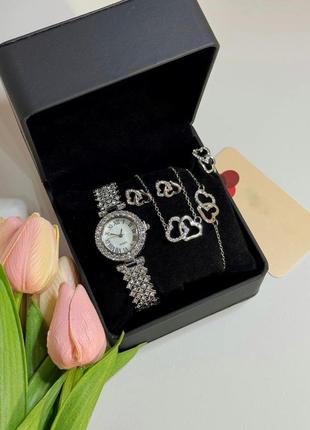 Розкішний годинник жіночий наручний кварцовий колір сріблястий у каменях у комплекті з сяйним браслетом сережки7 фото