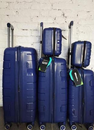 Небольшой дорожний чемодан полипропилен на 4 колесах размер s milano прочный черный чемодан ручная кладь10 фото