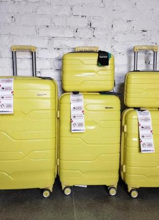Небольшой дорожний чемодан полипропилен на 4 колесах размер s milano прочный черный чемодан ручная кладь6 фото