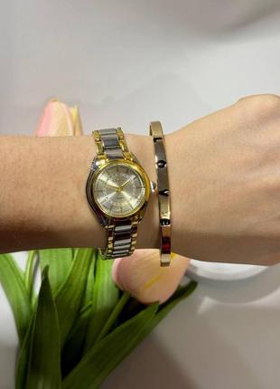 Часы женские наручные кварцевые цвет  серебристый с золотистыми вкраплениями в комплекте регулирующийся5 фото