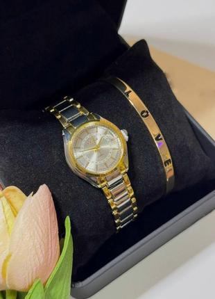 Часы женские наручные кварцевые цвет  серебристый с золотистыми вкраплениями в комплекте регулирующийся2 фото