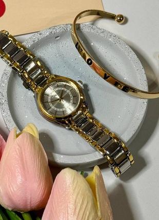 Часы женские наручные кварцевые цвет  серебристый с золотистыми вкраплениями в комплекте регулирующийся3 фото