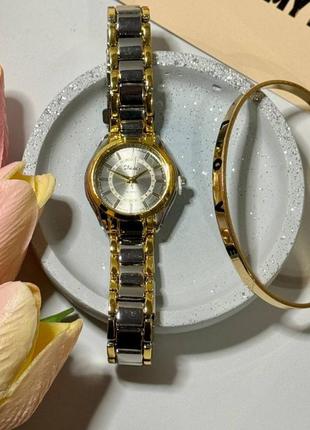Часы женские наручные кварцевые цвет  серебристый с золотистыми вкраплениями в комплекте регулирующийся4 фото