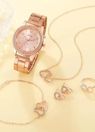 Часы женские наручные кварцевые цвет золотистый в камнях в комплекте с сияющим браслетом серьгами кольцом2 фото