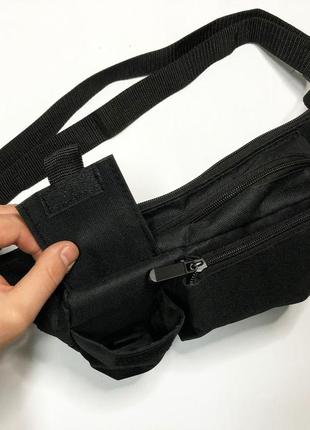 Качественная и надежная тактическая сумка-бананка из прочной и водонепроницаемой ткани черная через плечо10 фото