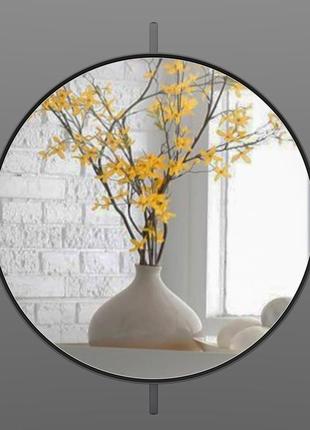 Круглое поворотное зеркало в металлической раме