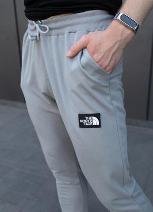 Спортивні штани сірого кольору для хлопця the north face, штани на резинці відмінної якості тонкі для спорту - m2 фото