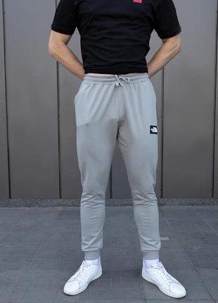 Спортивні штани сірого кольору для хлопця the north face, штани на резинці відмінної якості тонкі для спорту - m6 фото