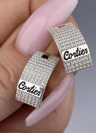 Срібні сережки cartier з золотими пластинами