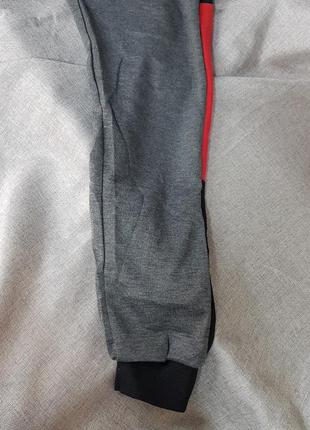 Спортивні штани, завужені на манжеті штани сірі з смужкою6 фото