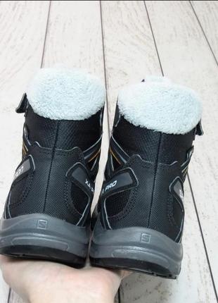 Salomon зимние ботинки для мальчика9 фото