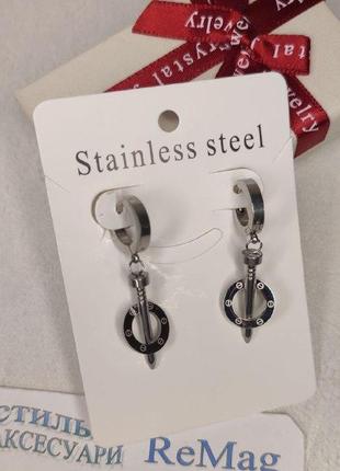 Незвичайні жіночі сережки "сріблясті великі цвяхи в кільці" ювелірна медична сталь - подарунок дівчині4 фото