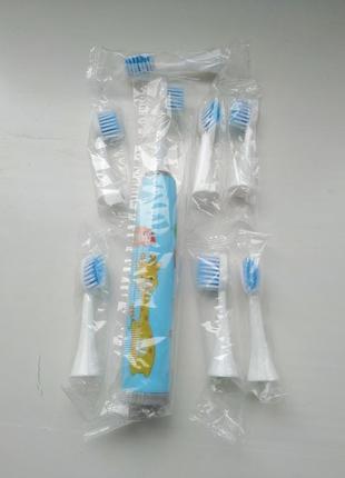 Дитяча зубна щітка електрична sonic toothbrush від 6 до 12 змінних насадок5 фото