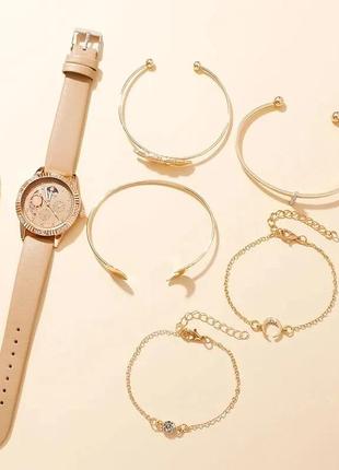 Комплект жіночих кварцових наручних годинників і браслетів.2 фото