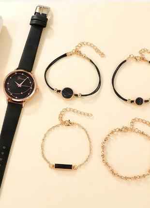 Комплект жіночий кварцевий наручний годинник та браслети.4 фото