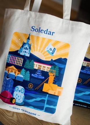 Екосумка, торба, шопер бежевий з ексклюзивним патріотичним авторським принтом - місто соледар, бренд “малюнки”2 фото