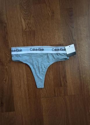 Комплект трусов стринги calvin klein2 фото