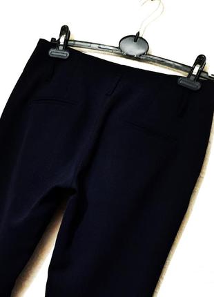 Kamomile актуальні класичні штани темно-сині злегка звужені донизу жіночі р487 фото